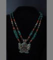 047 - Venduto - Antica collana tibetana con figura sciamanica sul ciondolo.