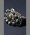 962 - VENDUTO - Antico bracciale totemico, argento, corallo, turchese, bronzo, 19th secolo, Tibet