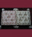 151 - Coppia di cuscini quadrati a fantasia, con nappe, seta, broccato